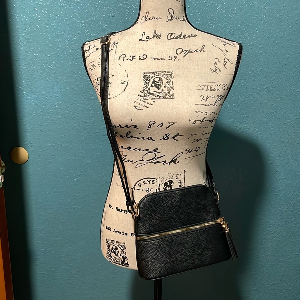 NWOT Small crossbody pebbled leather, front zippered pocket, fringed zipper pull